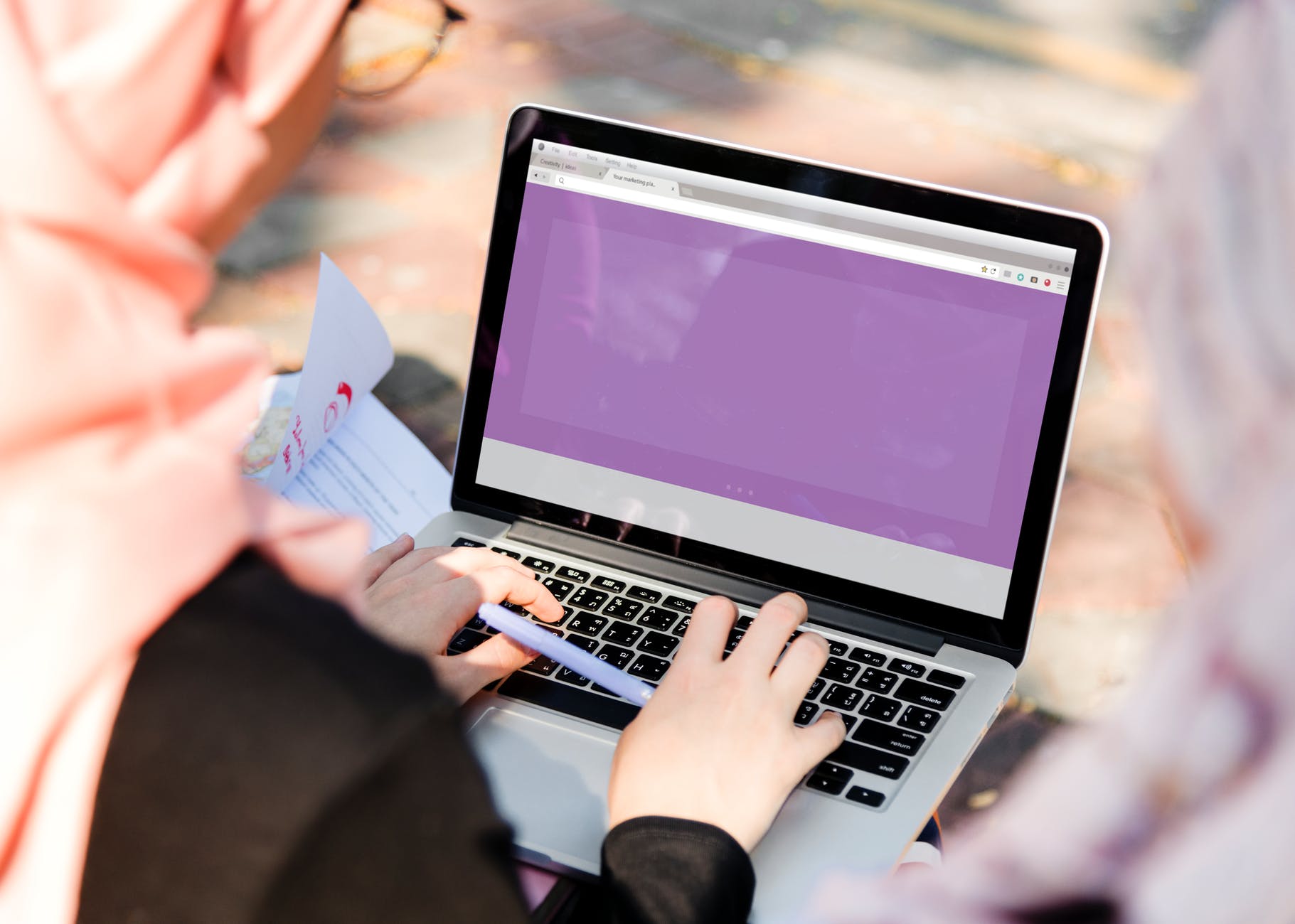 person using silver and black laptop computer