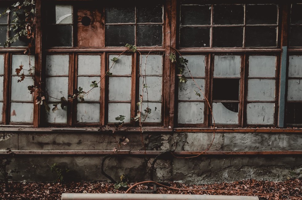 abandoned house near pathway